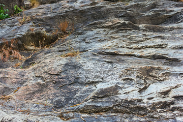 rock background at klong nam lai waterfall in thailand