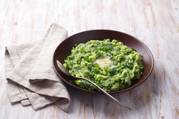 Colcannon, mashed potatoes with cale cabbage and green onions, traditional Irish dish	