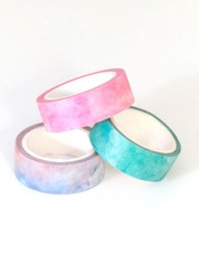 Colorful washi tapes on white background Craft supplies DIY