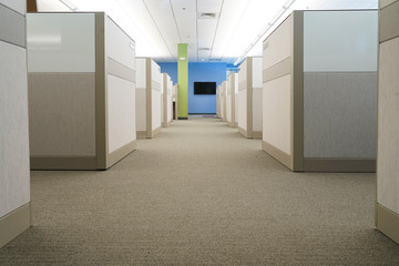 aisle between cubicles inside office building