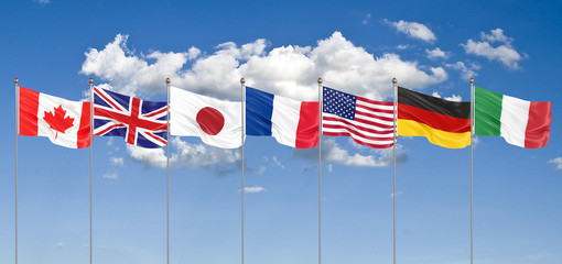 Silk waving G7 flags of countries of Group of Seven Canada, Germany, Italy, France, Japan, USA states, United Kingdom. Blue sky background. Big G7 in France 2019. 3D illustration.