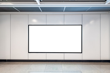 Blank advertising display in subway station underpass public area