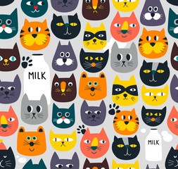 Creative seamless background with cats faces in funny cartoon style.