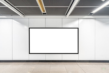 Blank advertising display in subway station underpass public area