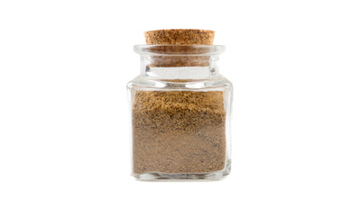 Ground or milled Caraway in glass  jar on isolated on white background. front view. spices and food ingredients.