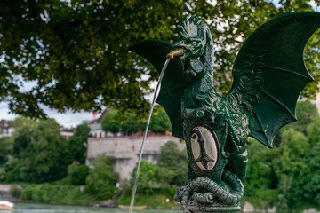 Statue, fountain of basilisk in Basel city