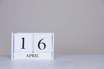 April Date Cube White Background