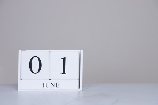 June Date Cube White Background