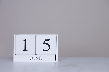 June Date Cube White Background