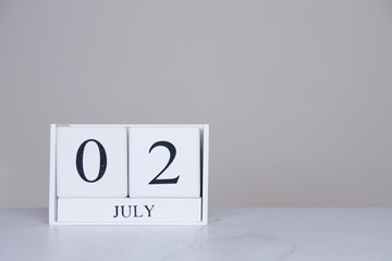 July Date Cube White Background