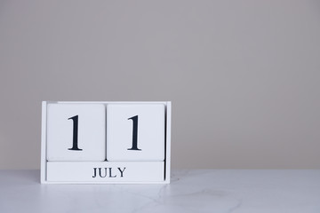 July Date Cube White Background