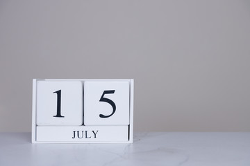 July Date Cube White Background