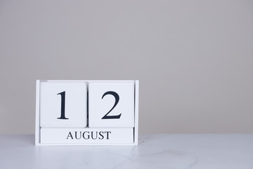 August Date Cube White Background