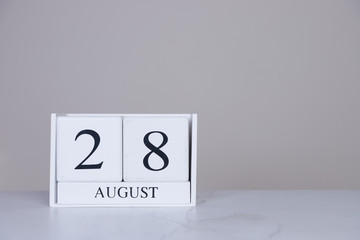 August Date Cube White Background