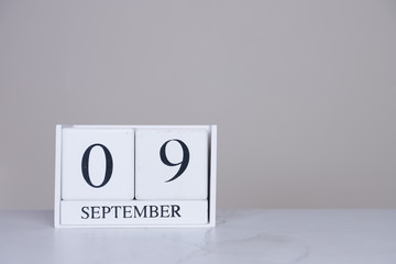 September Date Cube White Background
