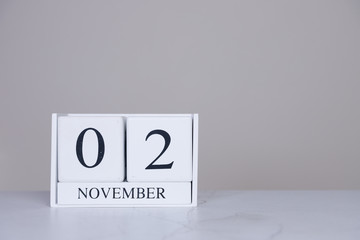 November Date Cube White Background