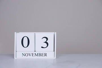 November Date Cube White Background