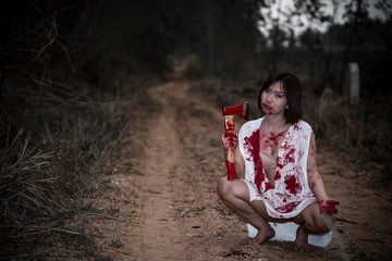 Portrait of asian woman make up ghost face,Horror scene,Scary background,Halloween poster,Thailand...