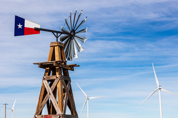 A wind turbine with a Texas flag