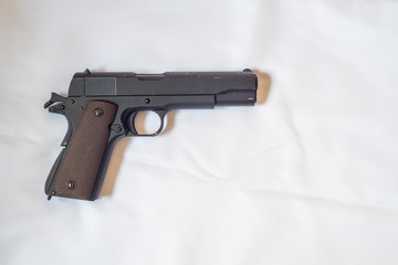 Handgun without magazine on white background