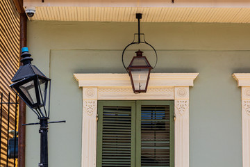 A lamppost and shutters, New Orleans