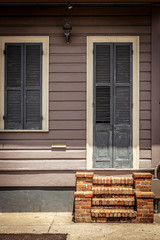 New Orleans French Quarter shuttered door and brickwork step
