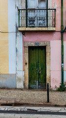 Fototapeta na wymiar Colorful doowary and balcony, Lisbon