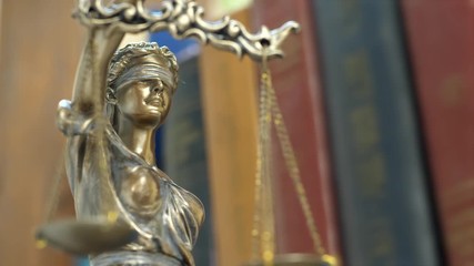 Symbol of Justice with Old Books. Tribunal and justice concept. Consultation with insurance lawyer and customer