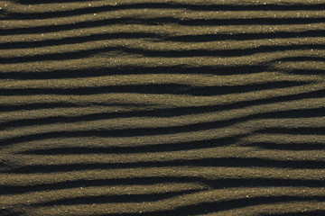 Smooth Flowing Ripple Pattern In Soft Beach Sand