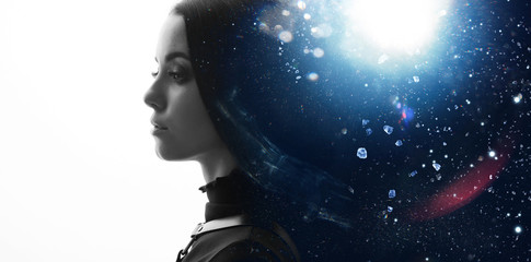 Double exposure of female face and galaxy. Abstract black and white woman portrait. Digital art.