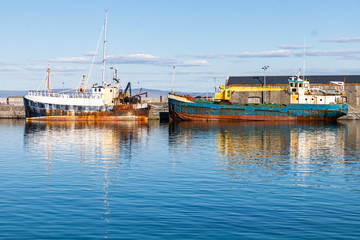 Ships in Kilronan village pier in Inishmore