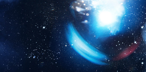 Lens Flare. Light over black background. Easy to add overlay or screen filter over photos. Abstract...
