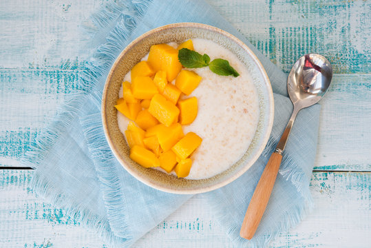 Oatmeal bowl with mango for Breakfast
