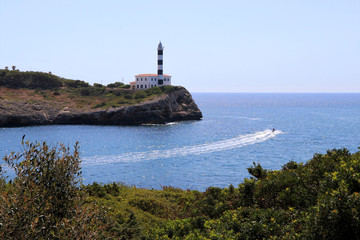 rock window with lighthouse - Porto Colom Mallorca Balearic Islands Spain
