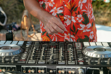 Soundboard with the hands of dj