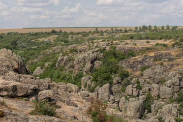 Large granite canyon. Village Aktove. Ukraine. Beautiful stone landscape.