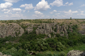 Fototapeta na wymiar Large granite canyon. Village Aktove. Ukraine. Beautiful stone landscape.