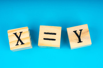 xyz letters written on wooden cubes