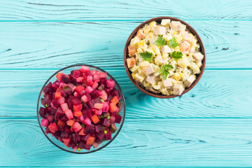 Traditional Russian salad olivier andvinaigrette