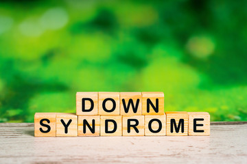 down syndrome word written in wooden cubes