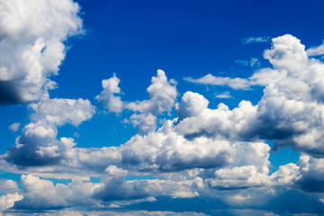 Bright white clouds in contrast with the blue sky