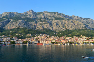  View of Makarska city center from the sea in Makarska,  Dalmatia, Croatia on June 11, 2019. 