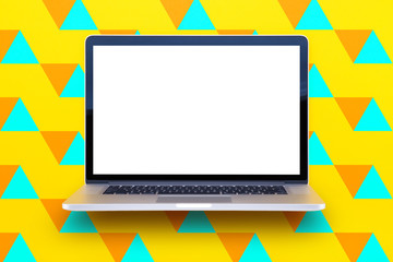 Computer staying on a table & showing the screen. Trendy & vibrant design. Geometry. Innovational digital internet applications & web business solutions. Modern workspace in an office. Development.