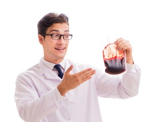 Doctor in blood donation concept isolated on white