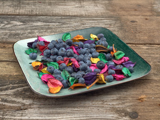 Delicious juicy ripe blueberries .On different background