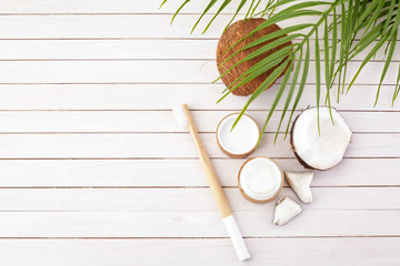 Coconut oil and mint homemade toothpaste, eco friendly bamboo toothbrush, natural healthcare.