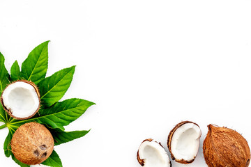Fototapeta na wymiar natural coconut to make organic cosmetics on white background top view space for text