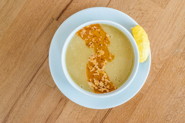 Turkish Lentil Soup with fried butter sauce / Mercimek Corbasi at Restaurant.