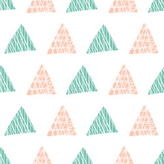 Vector geometric seamless pattern with rose and spearmint triangles on white background. Hand-drawn textured shapes print is a modern design for packaging, graphic, home decor, cards, wallpaper.