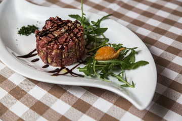 Beef tartare a summer appetizer to serve cold